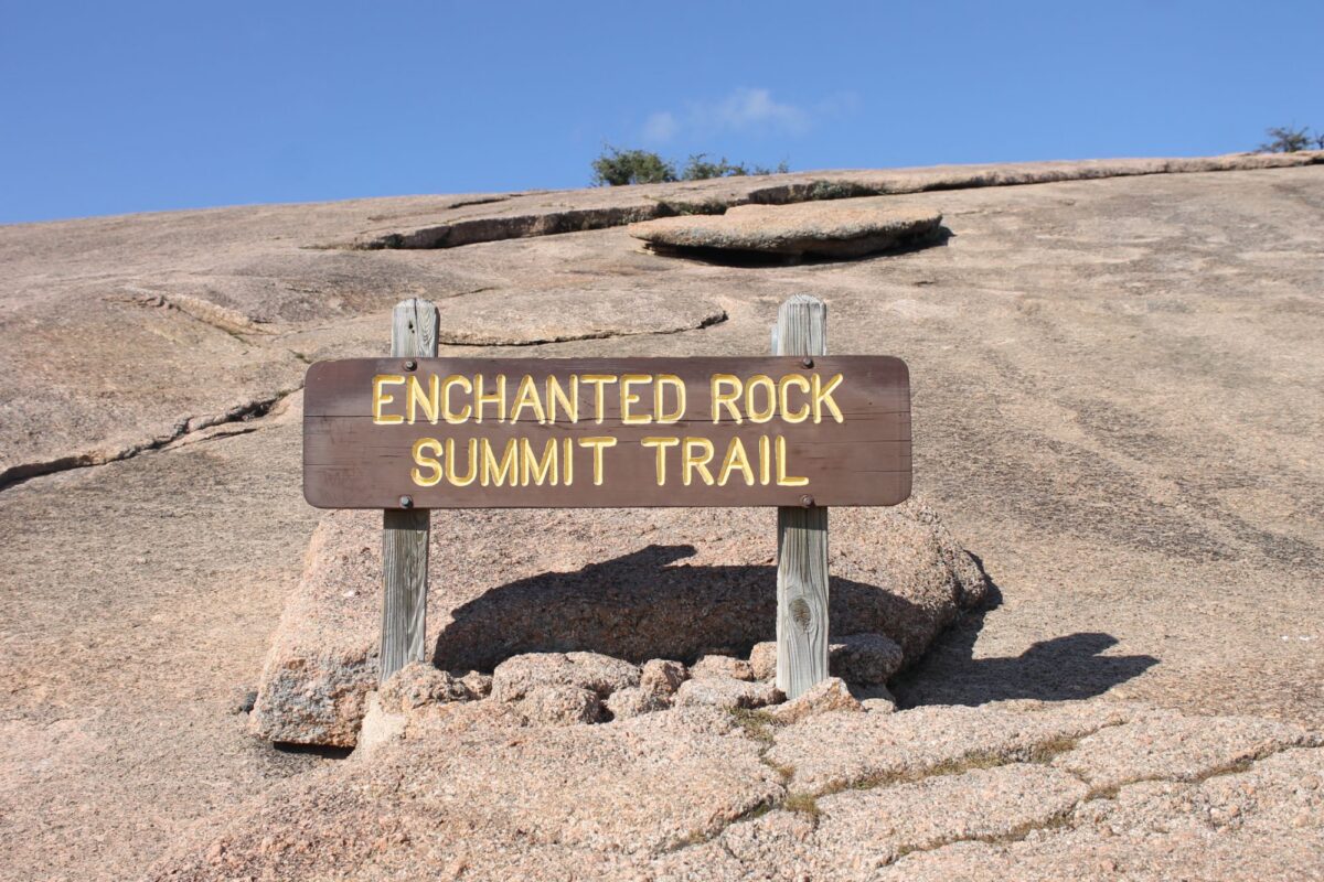 Summit Trail climbing the granite surface of Enchanted Rock in Texas